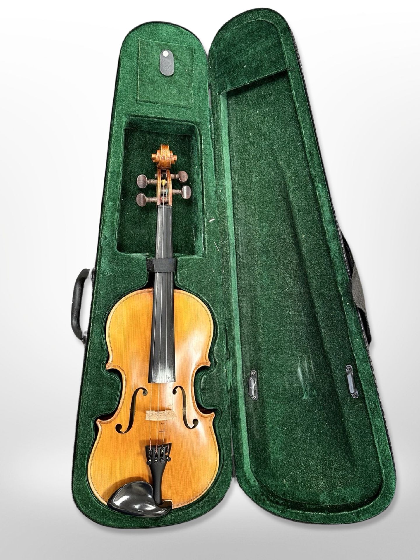 A violin with two-piece 14" back, with facsimile label 'Paul Mangenot, Mirecourt', in case.