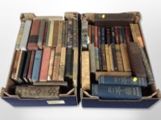 A collection of antiquarian volumes including Tolstoy, Dickens, and other classics.