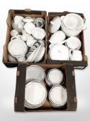 A collection of Polish white and silvered porcelain tea, coffee and dinner wares.