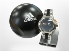 A Gent's Adidas sports watch in case