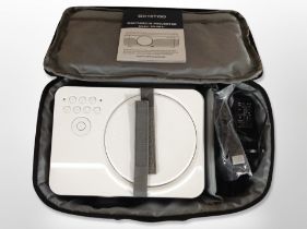 A multimedia projector in carry case, with lead.