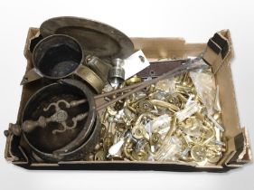 A quantity of brass door handles and other furniture, brass watering can, 19th-century fire tongs,