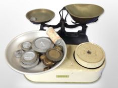 A set of Harper enamelled scales, one other set, and a group of weights.