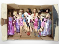 A group of Barbie dolls.
