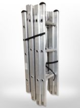 A folding aluminium extension ladder.