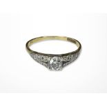 An 18ct gold and platinum diamond ring, size P CONDITION REPORT: 2.
