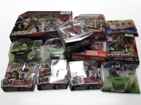 A box of Bandai, Hasbro and other figures including Star Wars, Ben 10, Fortnite, etc.