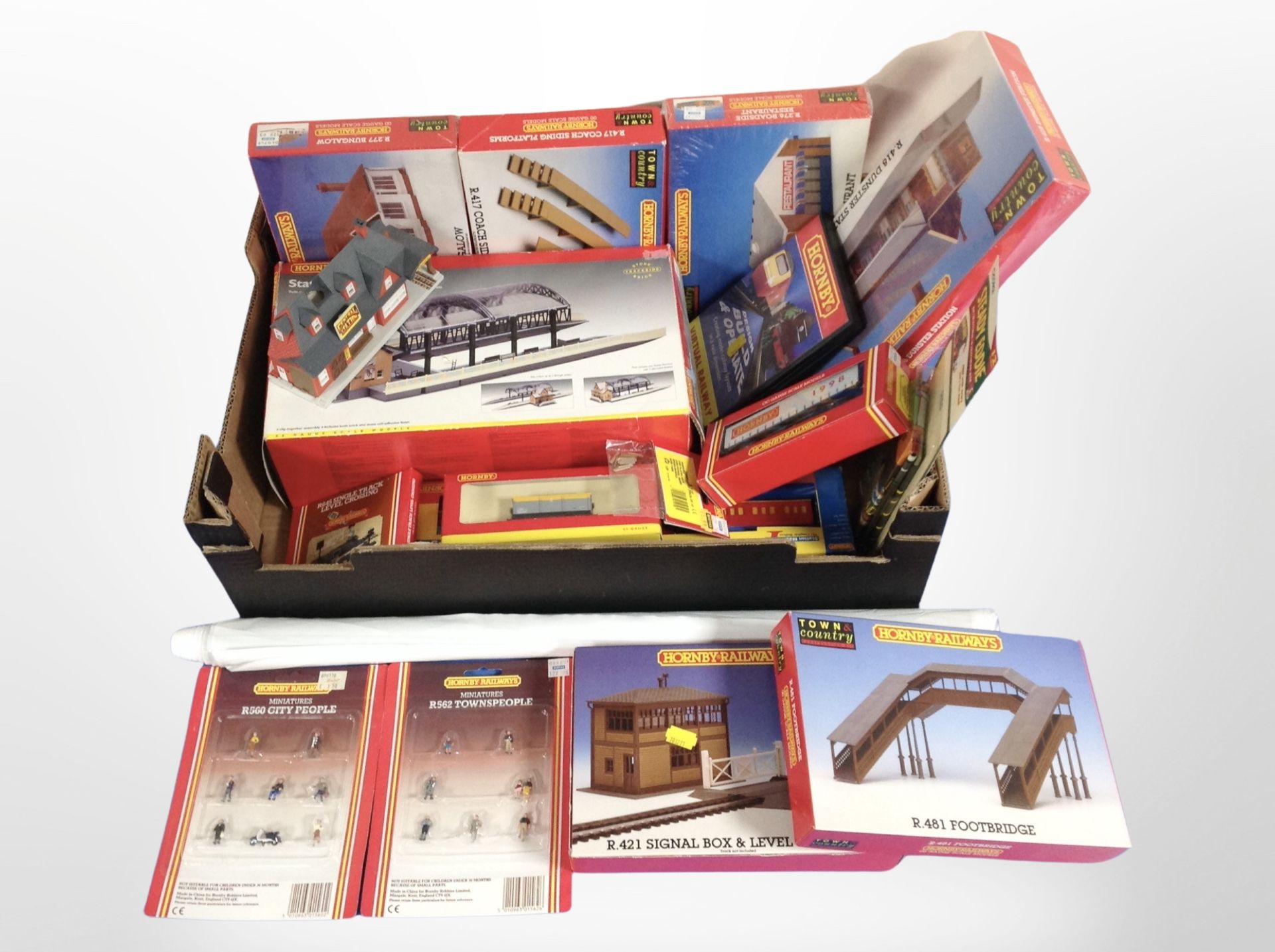 A group of Hornby and other model railway buildings and decorations, boxed.