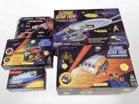 Four Playmates Star Trek models and a further trivia game, all boxed.
