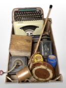 A vintage Erica typewriter, coffee grinder, teak hanging wall clock, walking stick, metal lantern,
