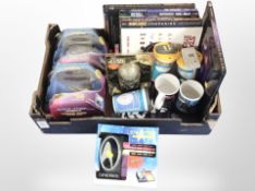A group of Star Trek collectibles including models, books, audio cassettes, mugs, etc.