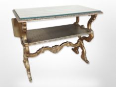 A gilt two-tier occasional table with plate glass top,