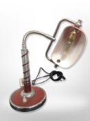 A 20th-century chrome and enamelled adjustable desk lamp, height 40cm.