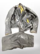 A vintage black leather motorcycle jacket and pair of trousers, waist 31.