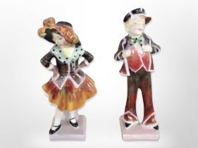 Two Royal Doulton figures, 'Pearly Boy' HN 2035 and 'Pearly Girl' HN 2036.