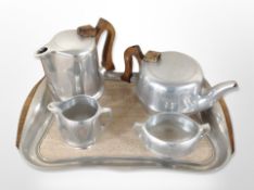 A Picquot ware four-piece tea service on matching tray, width 42cm.