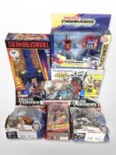 Seven Hasbro Transformers figures, boxed.