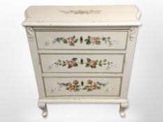 A French style painted three-drawer chest,