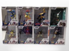 Eight Zoteki figures including X-Men, Avengers, etc., boxed.