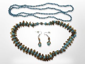 An amber and faux turquoise necklace and matching earrings plus a similar bead necklace