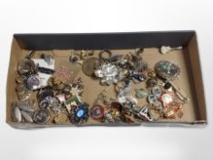 A tray containing assorted brooches, pins, dress rings, etc.
