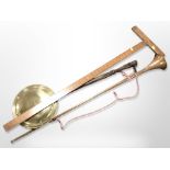 A brass bed-warming pan, a draughtsman's rule, and a copper and brass horn.