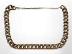 An antique 9ct gold curb-link bracelet with chased decoration,