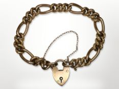 An antique 9ct gold padlock bracelet with ornate engraved links CONDITION REPORT: