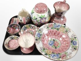 A collection of Maling pink lustre ceramics.