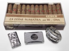 A pack of 24 Geber Feine Sumatra cigars, together with a Kingsway Juno lighter,