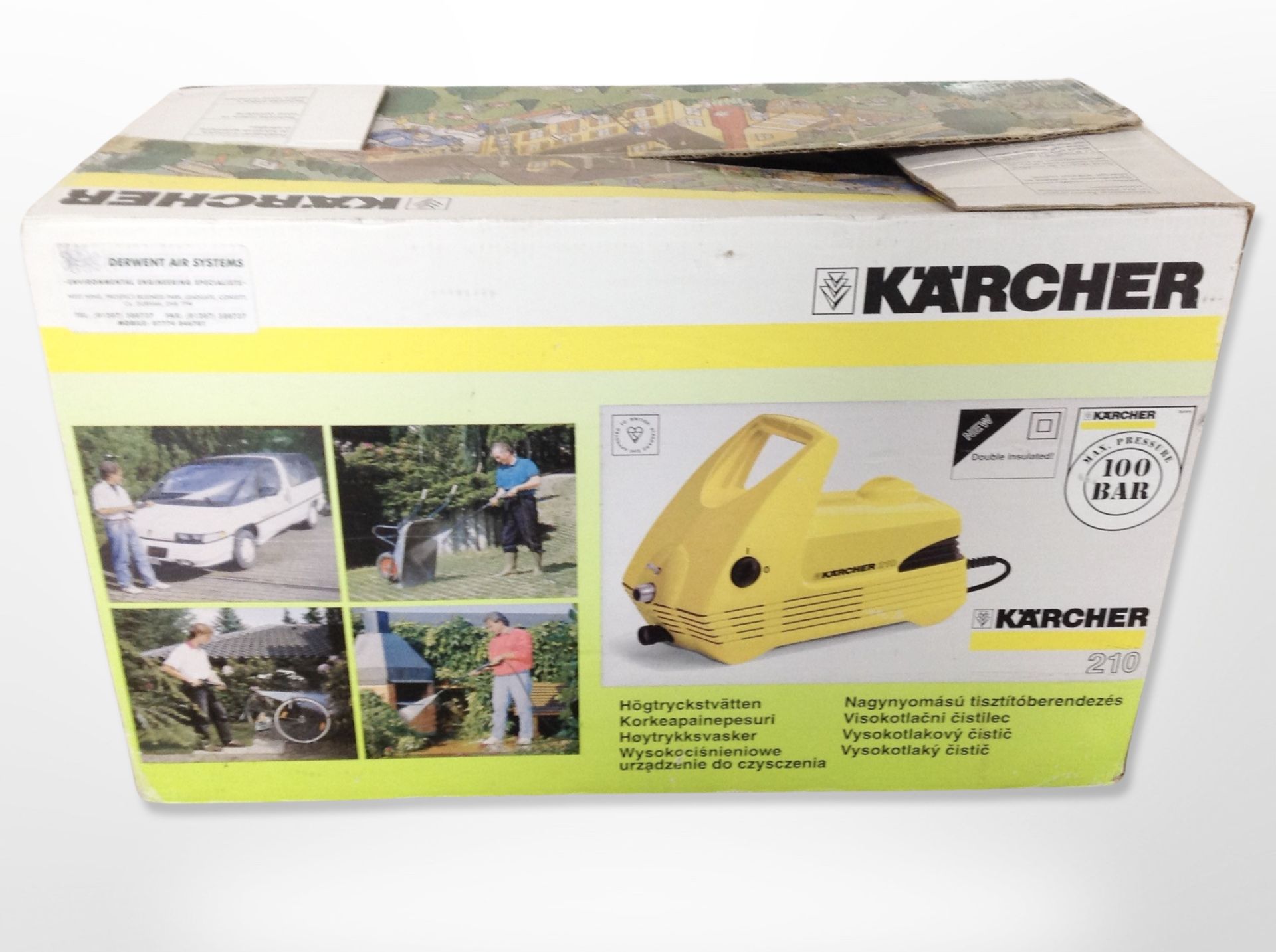 A Karcher pressure washer in box.