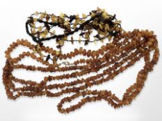 A group of amber necklaces