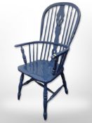 A painted Windsor spindle back kitchen armchair,