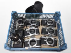 Eight Pentax ME Super camera bodies, one with Chinon 1:1.9 50mm lens.