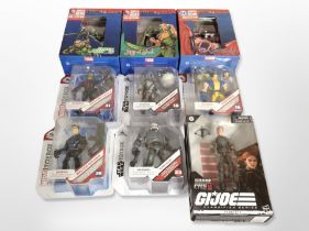 A group of Disney, DC and Hasbro figures including Star Wars, Marvel, G.I. Joe, etc., boxed.