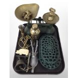 A set of enamelled and brass scales with weights, painted trivets, wall bell, brass keys, etc.