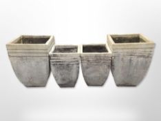 Two pairs of reconstituted stone garden planters,