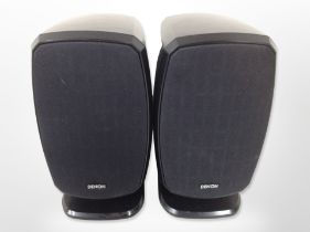 A pair of Denon S-81 speakers.