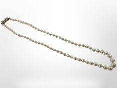 A cultured pearl graduated necklace with silver gilt clasp, length 44 m.