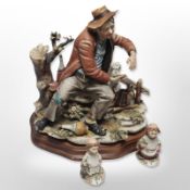 A large Italian porcelain figure of a tramp, height 33cm,