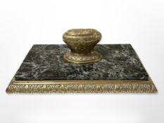 An ornate brass and green marble desk weight, length 20 cm.