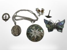 A group of silver jewellery to include pendant on chain, two abalone shell brooches,