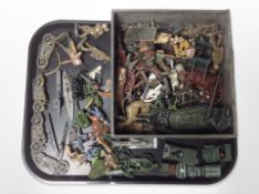A group of play-worn diecast metal and plastic figurines including soldiers, Native Americans,