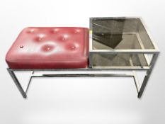 A chrome and red buttoned leather telephone seat with smoked glass paneled top,
