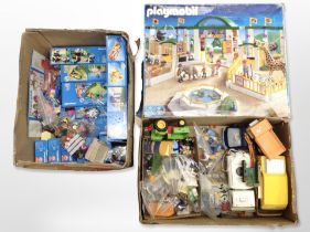 A large quantity of Playmobil toys.