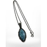 A Sterling silver necklace with silver and turquoise lozenge shape pendant, chain length 40 cm.
