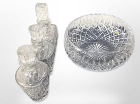 A Stuart crystal fruit bowl in box, together with three crystal decanters.