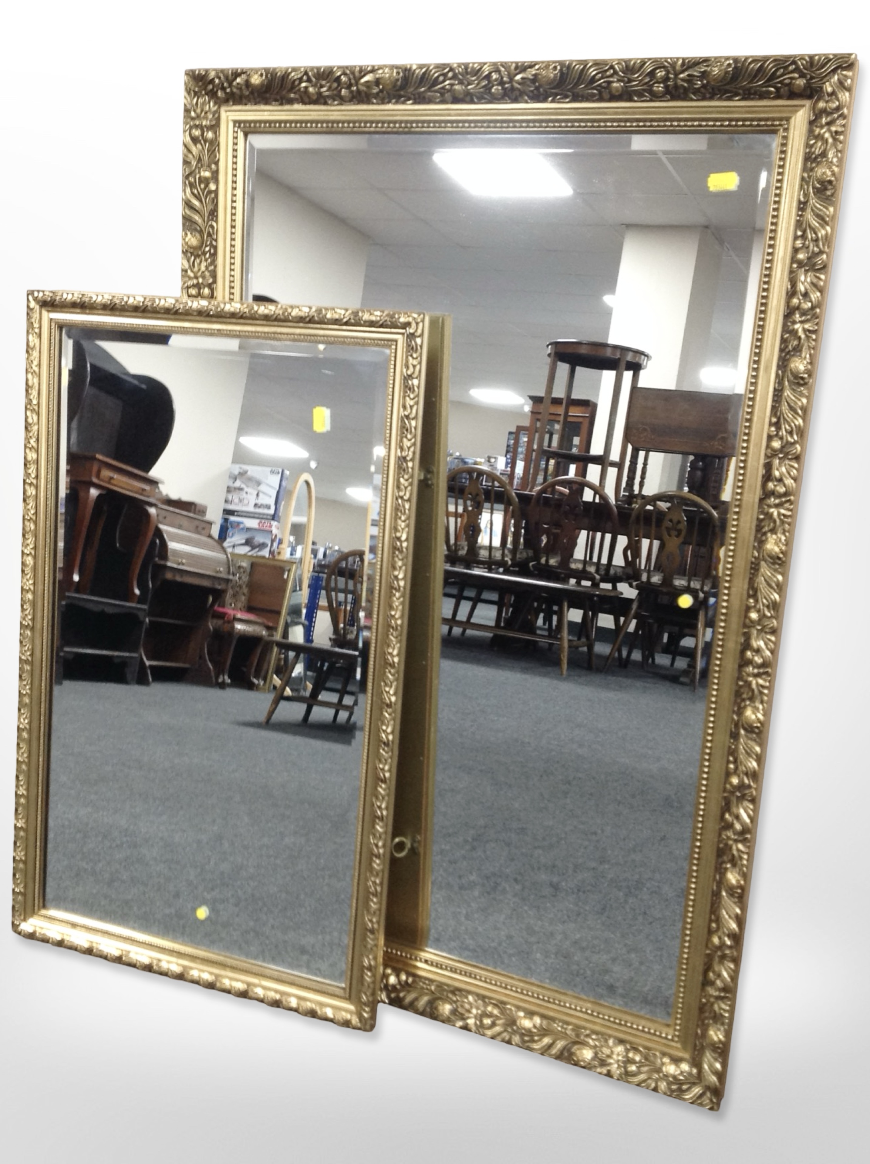 Two contemporary gilt-framed mirrors, largest 96cm x 65cm.