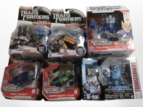 Six Hasbro Transformers figurines, boxed.