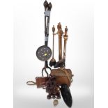 A group of oriental and African hardwood carvings, a copper-plated companion set on stand,